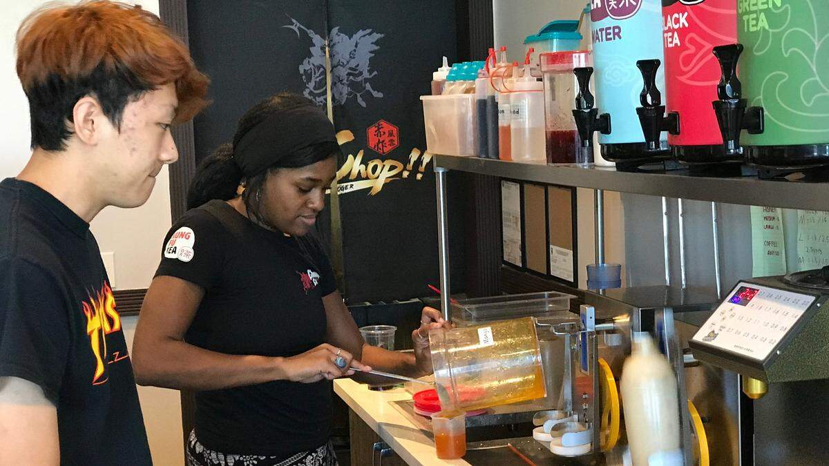 Jason Jing and Maxine Ramsdell stayed busy Wednesday filling Kung Fu tea orders.