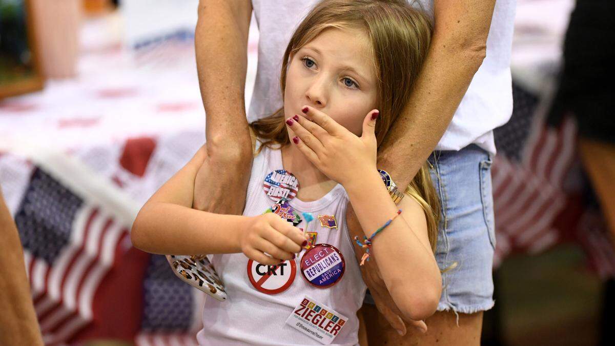 Mia Wells joined her parents along with hundreds of Sarasota and Manatee County residents who attended a GOP candidate rally at Robarts Arena on Saturday, July 16, 2022, to hear from top Republican leaders.