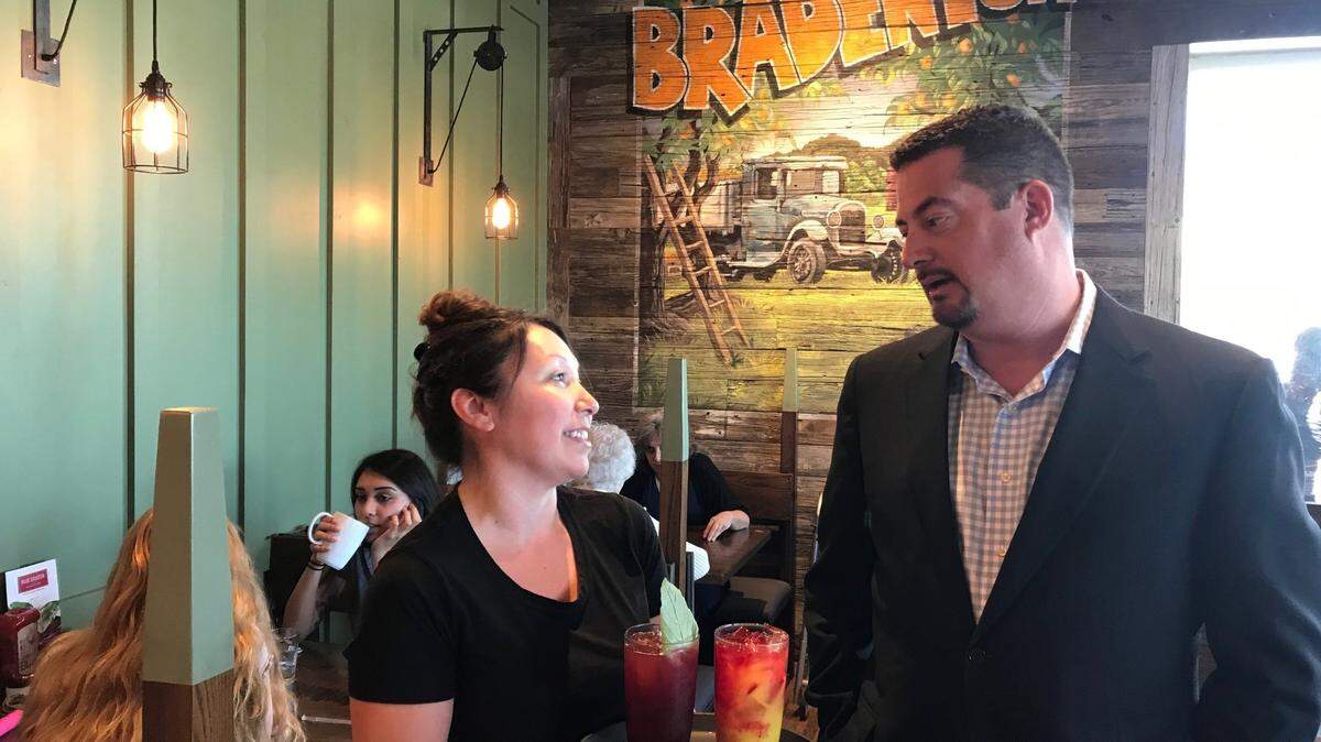 First Watch CEO Chris Tomasso visits with staff member Anya Christianson on 3/21/2019 at the &nbsp;First Watch restaurant 4324 53rd Ave. E., Bradenton.