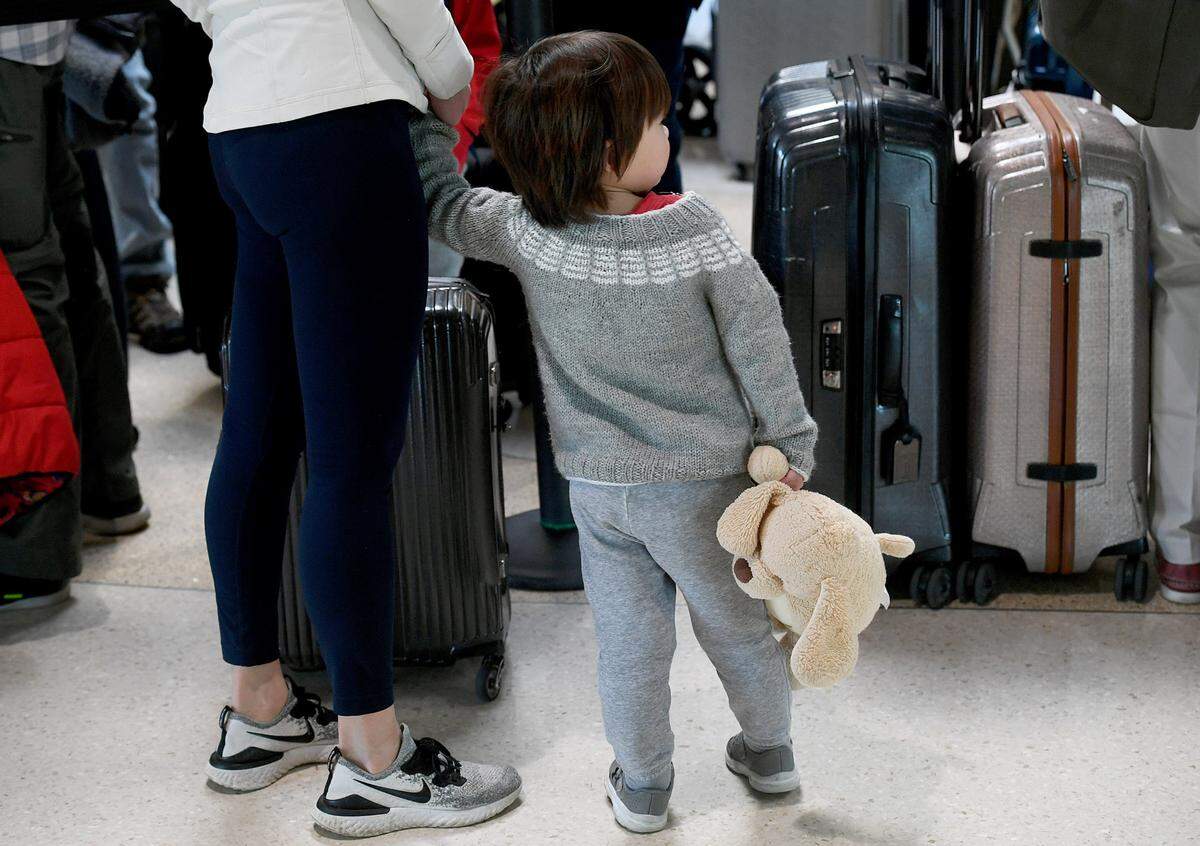 Passengers line up at the ticket counters at the Sarasota Bradenton International Airport on the morning of Dec. 27, 2022.