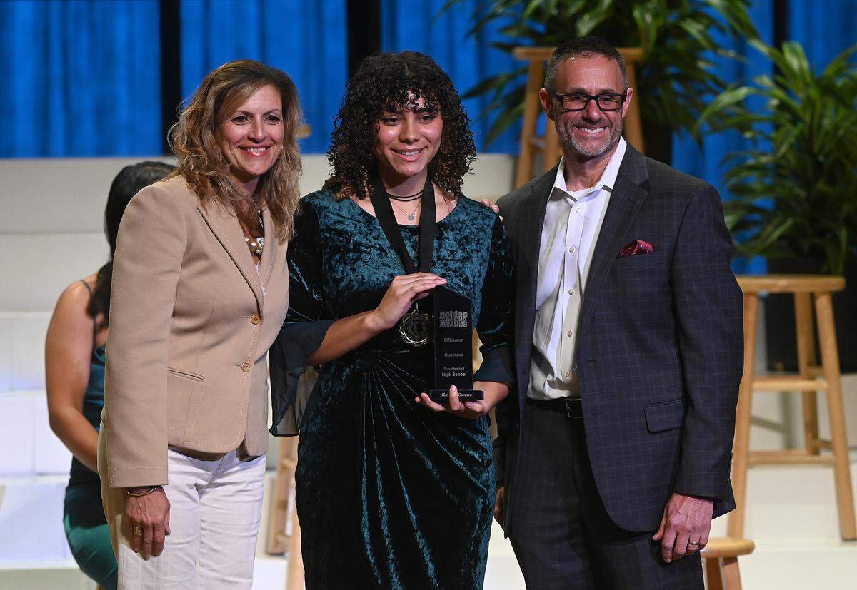 2023 Golden Herald Award winner in Business Kaliyah Owens with presenters Jackie Barron and Tom McDougal Thursday night.