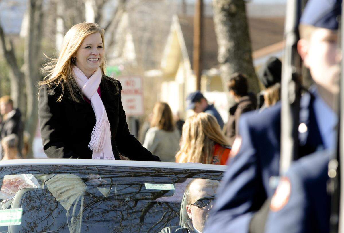 Jessica Lynch, who shot to fame as a POW during the Iraq war in 2003, is featured in the South Charleston, W.Va. Christmas Parade Saturday, Dec. 10, 2011. (AP Photo/Bob Bird)