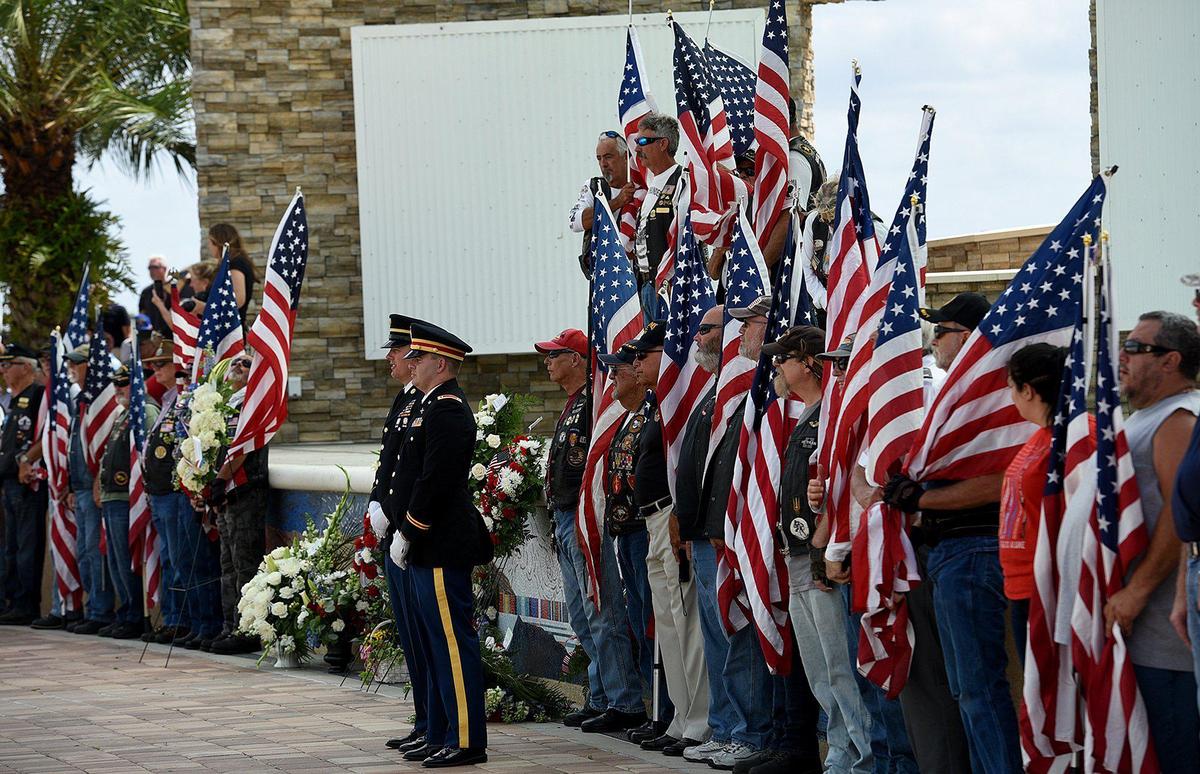 Thousands arrived to pay respects to a veteran they never met; Edward Pearson, at the Sarasota National Cemetery on Tuesday.