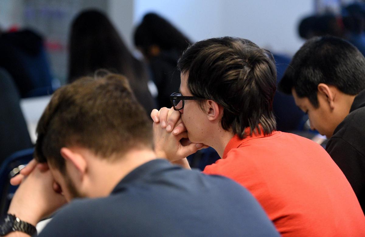 Manatee School for the Arts students observe a moment of silence one year after the tragedy at Marjory Stoneman Douglas.