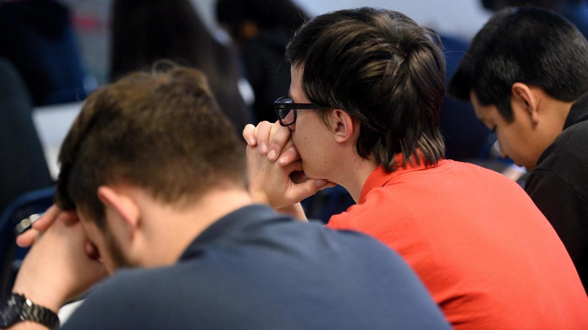 Manatee School for the Arts students observe a moment of silence one year after the tragedy at Marjory Stoneman Douglas.