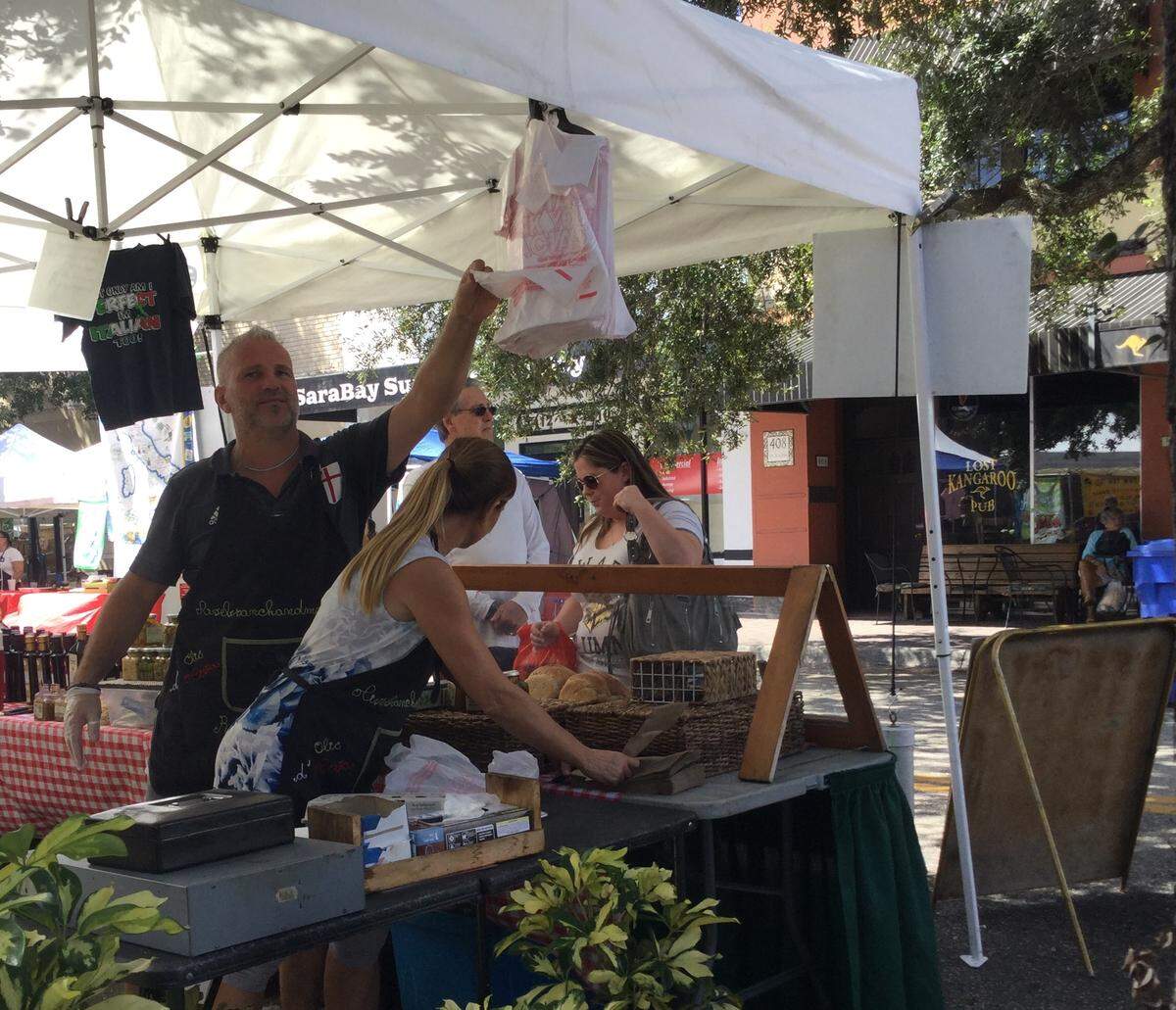 Visitors to Saturday’s kickoff Farmers Market season like what they see at Rustic’s Breads. There are more than 35 vendors offering a variety of goods and wares. The market will be the first Saturday of every month through May.