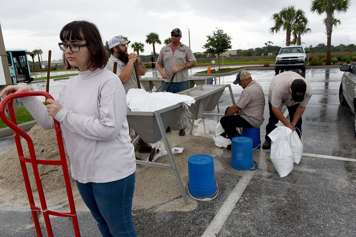 Manatee County Public Works employees fill sandbags at the transit fleet authority Friday afternoon ahead of subtropical storm Alberto.
