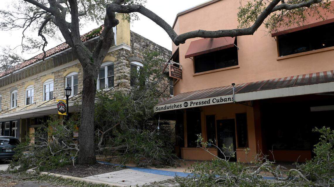 Downed tree limbs littered the sidewalks of Old Main Street in downtown following Hurricane Ian in Bradenton on Sept. 29, 2022.