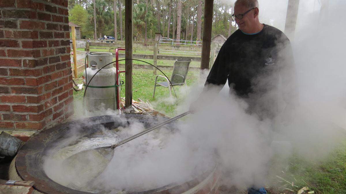 Sugar cane is boiled down in a kettle during last year's first A Taste of Old Miakka. The second annual A Taste of Old Miakka is scheduled Saturday at Crowley Museum and Nature Center near Myakka State Park in Sarasota County. 
 PROVIDED PHOTO