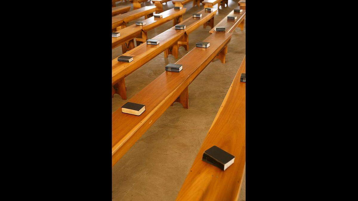 Benches set up for Sunday services. After the service, the benches serve as tables for the lunch meal.