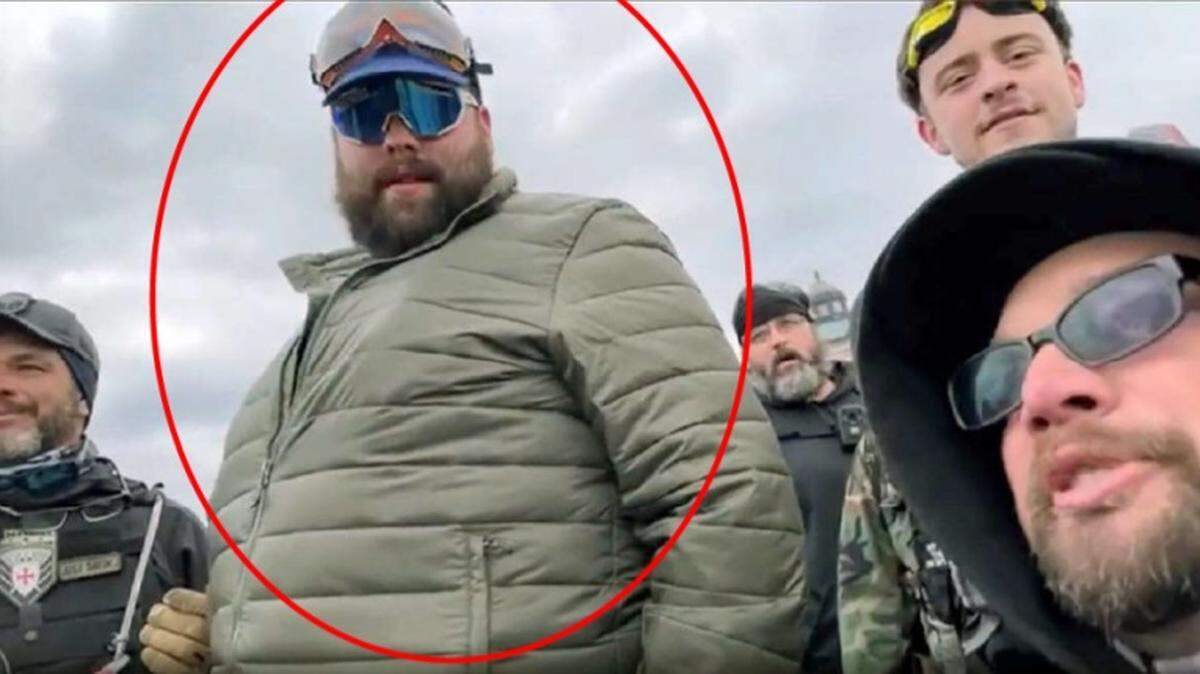 Daniel Lyons Scott, circled, has pleaded guilty for assaulting law enforcement during the Jan. 6. siege of the U.S. Capitol.