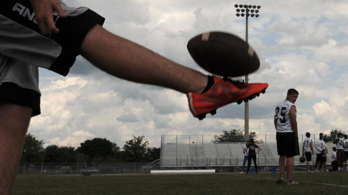 Braden River punter Colton Heath practices along the sideline during the first day of spring football practice Monday at Braden River High School. 
 GRANT JEFFERIES/Bradenton Herald