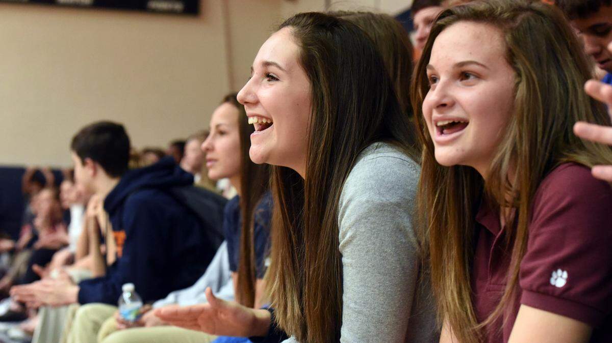 Bradenton Christian students cheer during a welcome back pep rally for the basketball team after bringing home the runner-up title to the state championships. 
 TIFFANY TOMPKINS/Bradenton Herald