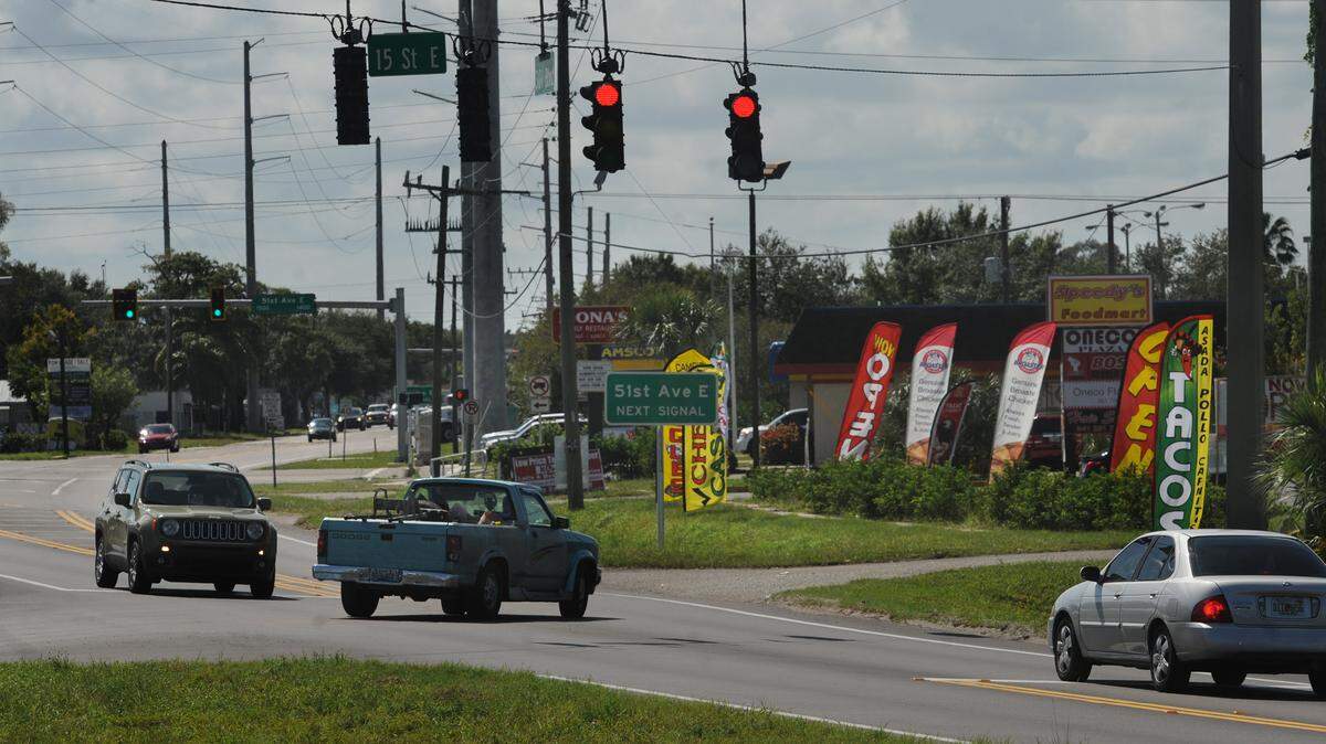 Traffic moves through the 15th Street East and 301 Blvd. east intersection. Florida Department of Transportation is looking to make multimodal improvements to the worn two-lane road 15th Street East corridor. 
 GRANT JEFFERIES/Bradenton Herald