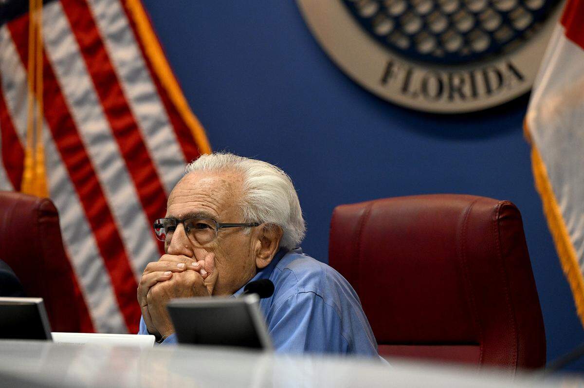 The Manatee County Planning Commission voted 4-2 not to recommend changes that would scale back the county’s wetland protection rules on Thursday. David Roth listens as land use and water policy consultant Daniel DeLisi makes a presentation to the commission.