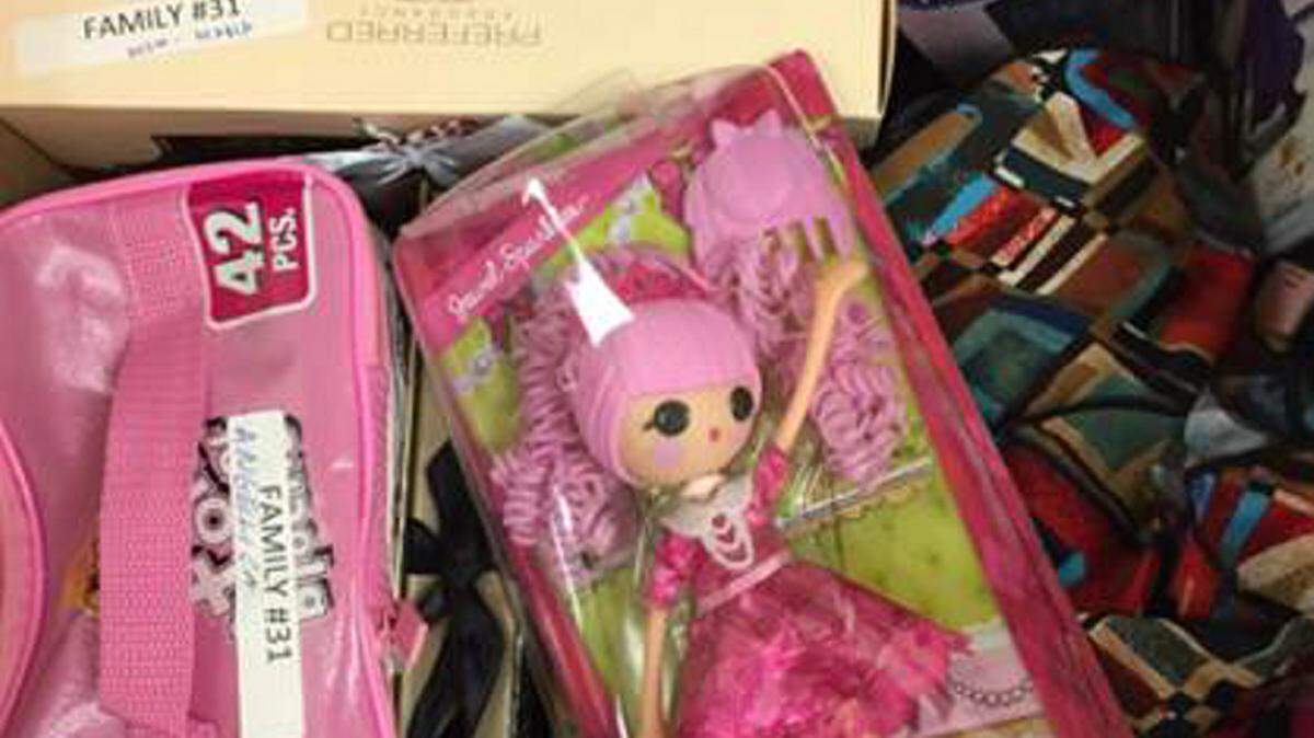 Manatee County Public Works Department donated more than 400 gifts and $745 worth of gift cards to the Family Partnership Center's Adopt-A-Family for Christmas program. 
 PHOTO PROVIDED
