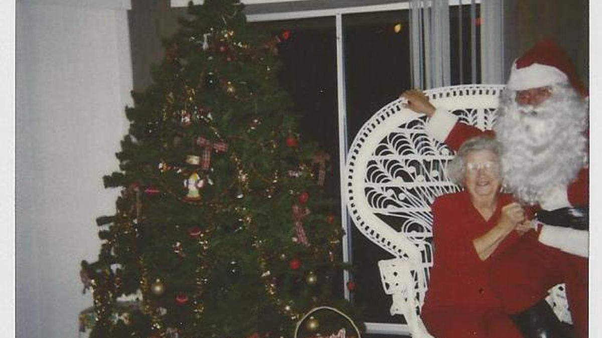Jo Harrison at Celebration House in Palmetto for a Christmas party for needy children. Imagine she just convinced Santa to support one of her causes: "Santa, all I really want for Christmas is to save our heritage!" PHOTO PROVIDED
