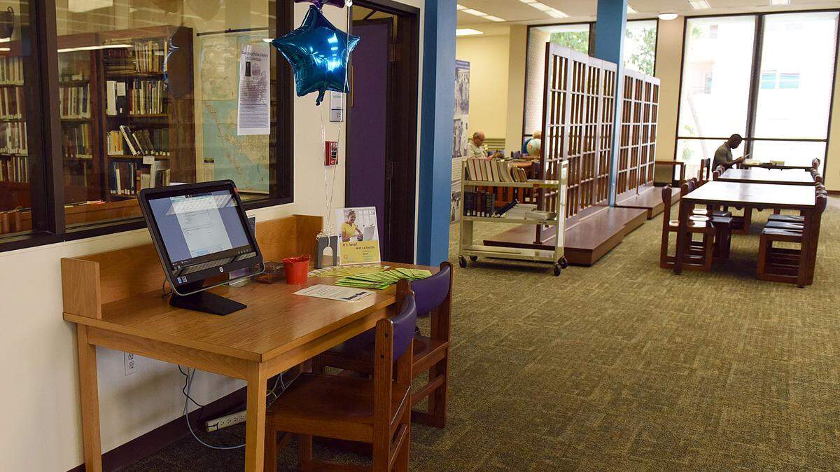 Bradenton Central Library displays a new library catalog system on one of the new touch-screen computer kiosks. The software, called Polaris, can be accesssed via any computer with internet access. 
 TIFFANY TOMPKINS-CONDIE/Bradenton Herald