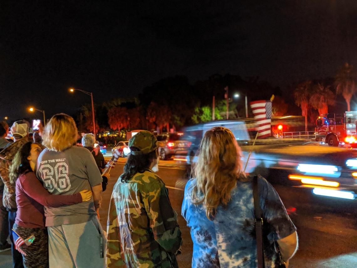 An escort accompanying fallen soldier and Bradenton native Nicholas C. Panipinto passed along Eighth Avenue West in Palmetto on November 13, 2019 as Manatee County residents gathered to pay tribute.