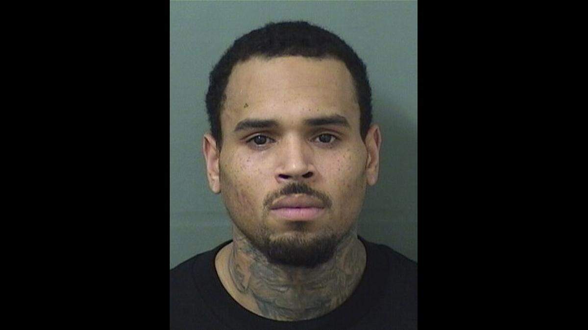Singer Chris Brown, 29, was arrested in Palm Beach County Thursday night on a warrant. Brown is scheduled to perform in Tampa Friday night.