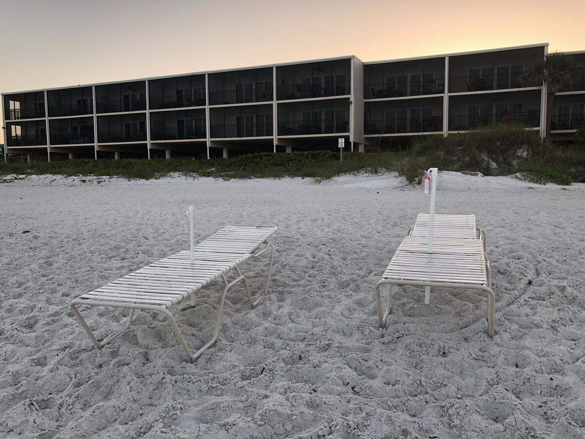 Beach chairs sit on Bradenton Beach early Wednesday. Because they remained there overnight, volunteers with Anna Maria Island Turtle Watch tagged the set because they can interfere with sea turtle nesting.