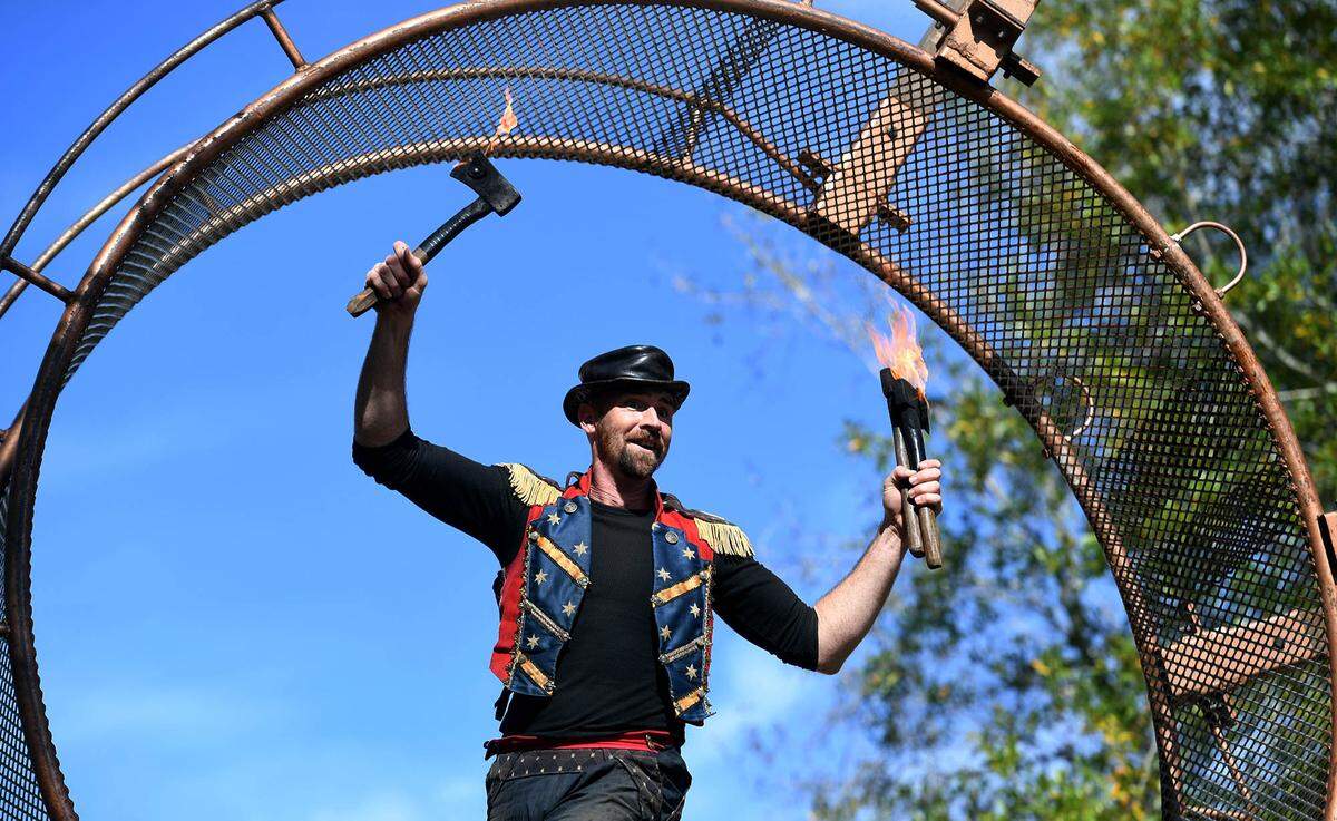 11/14/21—Ichabod Wainwright performs on the Wheel of Death at the Sarasota Medieval Fair in Myakka Sunday.