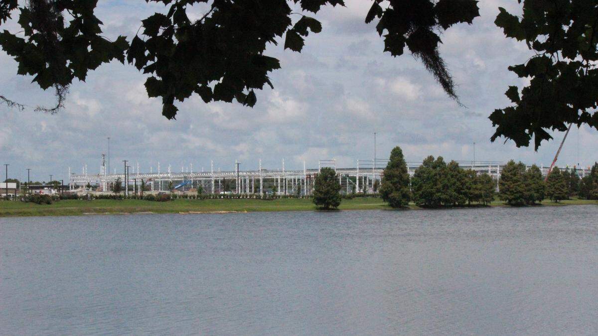 From a distance, the new Costco wholesale warehouse that is going up at Heritage Harbour resembles a bridge.