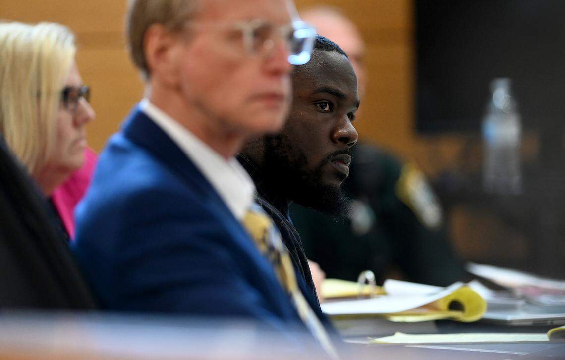 Larry Bernard Williams, 25, sits between his attorneys the Manatee County Judicial Center Tuesday, May 2, 2023 while on trial for the death of his ex-girlfriend and 8 month-old son. Williams was found guilty on two charges of first-degree murder and an arson charge for the 2017 killings of his ex girlfriend and infant son.