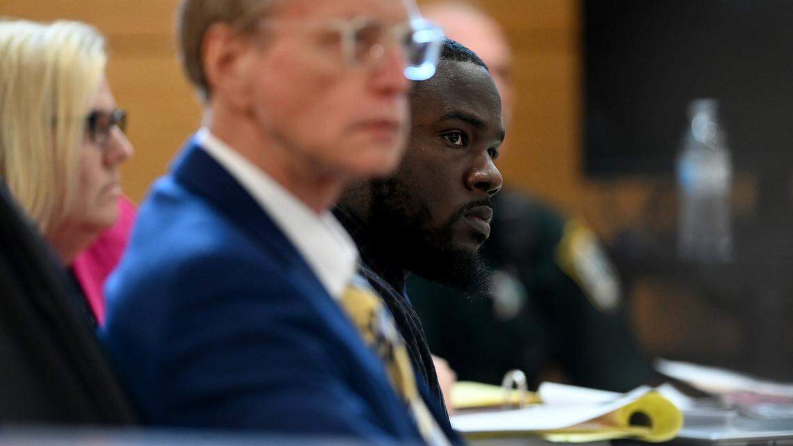 Larry Bernard Williams, 25, sits between his attorneys the Manatee County Judicial Center Tuesday, May 2, 2023 while on trial for the death of his ex-girlfriend and 8 month-old son. Williams was found guilty on two charges of first-degree murder and an arson charge for the 2017 killings of his ex girlfriend and infant son.