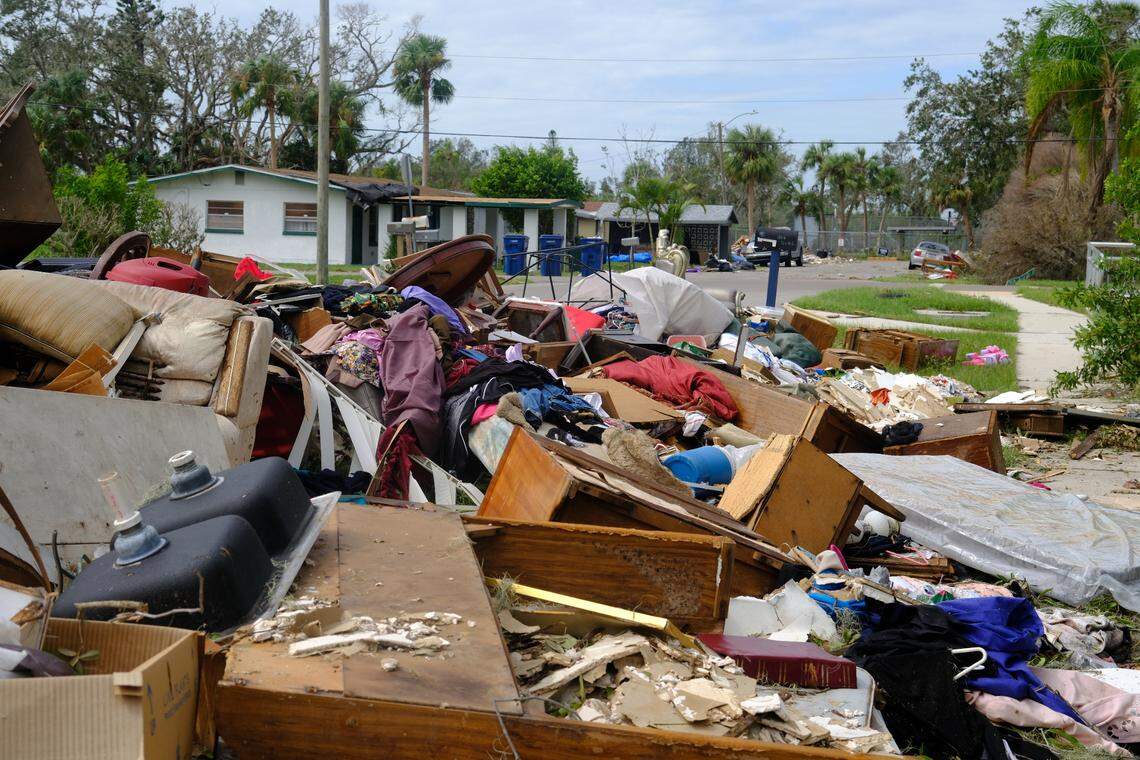 Wreckage from homes devastated by hurricanes Helene and Milton lines the streets in the Rubonia community in Manatee County. Friday, Oct. 11, 2024.