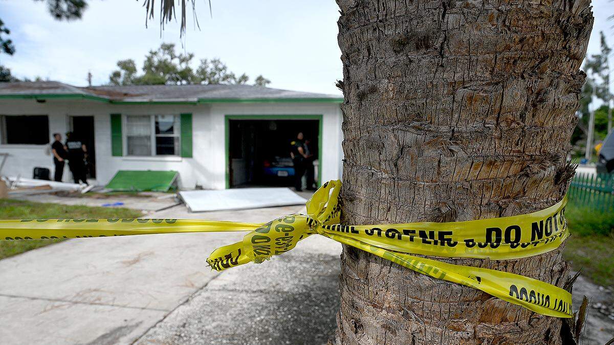 Manatee County Sheriff’s Office deputies continue to gather evidence and investigate at the scene of an hours-long standoff in the 800 block of 63rd Avenue West on September 11, 2025. While attempting to serve a warrant related to armed robbery, the suspect fired shots at deputies, the sheriff’s office said.