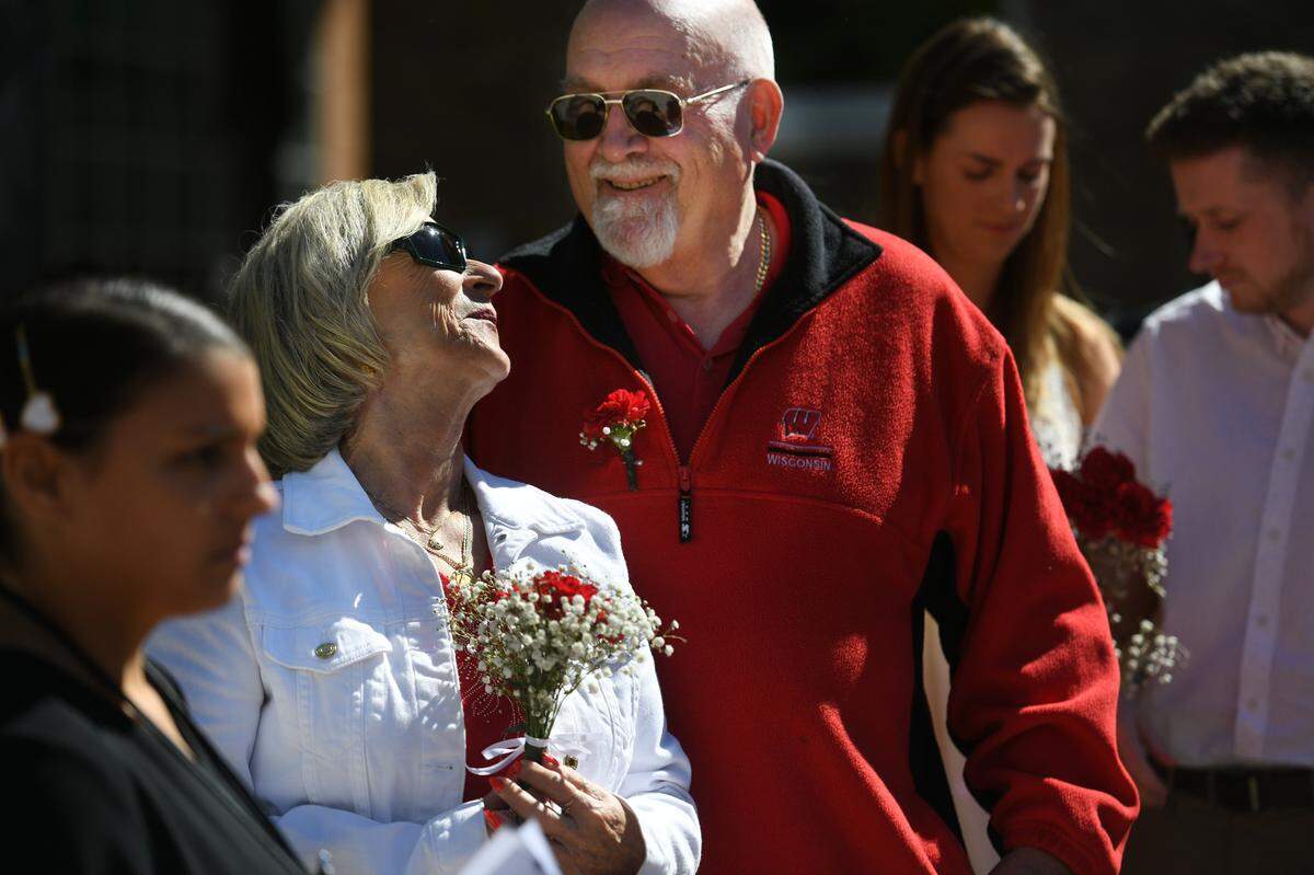 Lena Schuetz and Mike Sansone smile after couples made their relationships official during a group wedding ceremony at the Manatee County Historic courthouse’s gazebo on Feb. 14, 2022. Clerk of Court’s Angel Colonneso officiated over the ceremony where couples recited their vows.