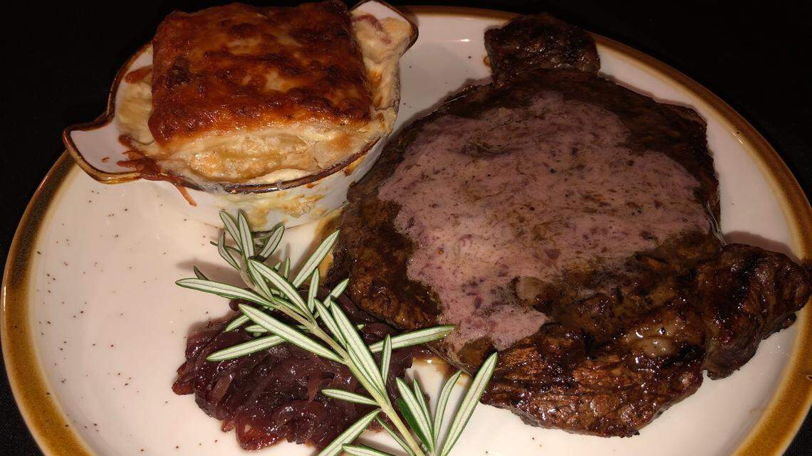 A 16-ounce ribeye steak with Cabernet butter and choice of potato is one of the offerings at Bourbon and Bones restaurant at Lakewood Ranch.