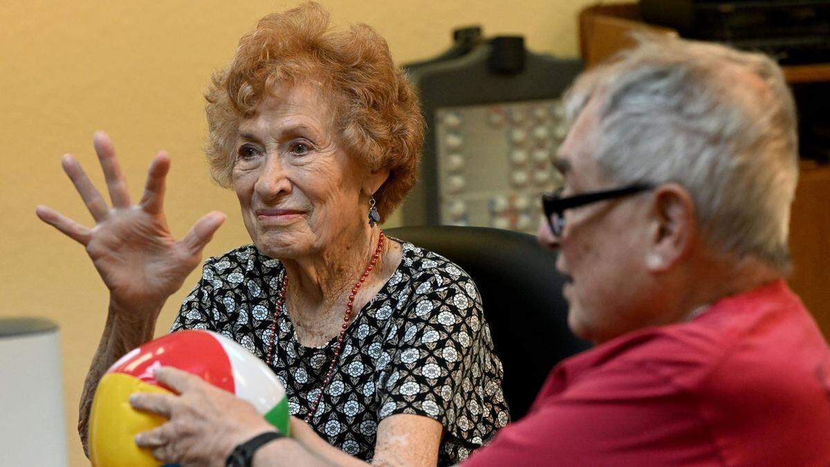 Seniors at the Daybreak Adult Day Center 10920 SR 70 E, Bradenton enjoy games of hot potato and table balloon tennis on June 26, 2024.