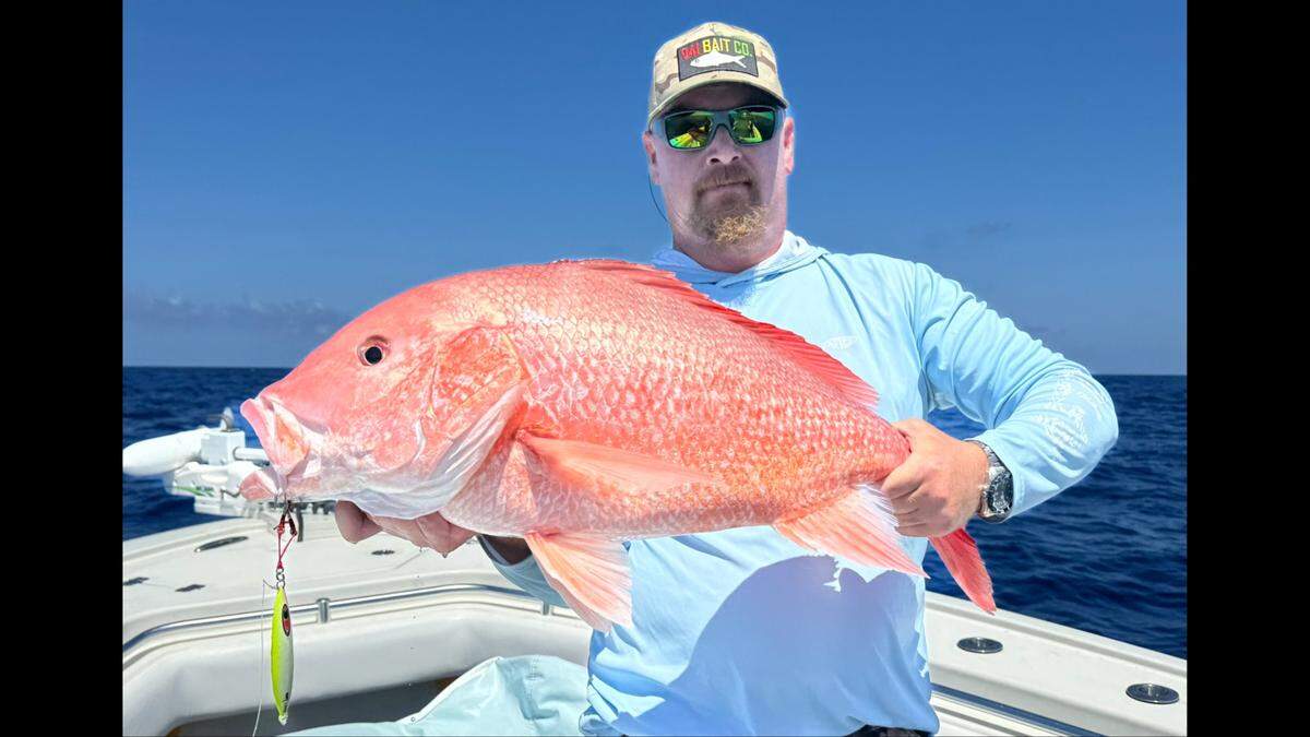 Patrick Diercks poses with a red snapper caught fishing this past week on a slow-pitch jig in the Gulf of Mexico.