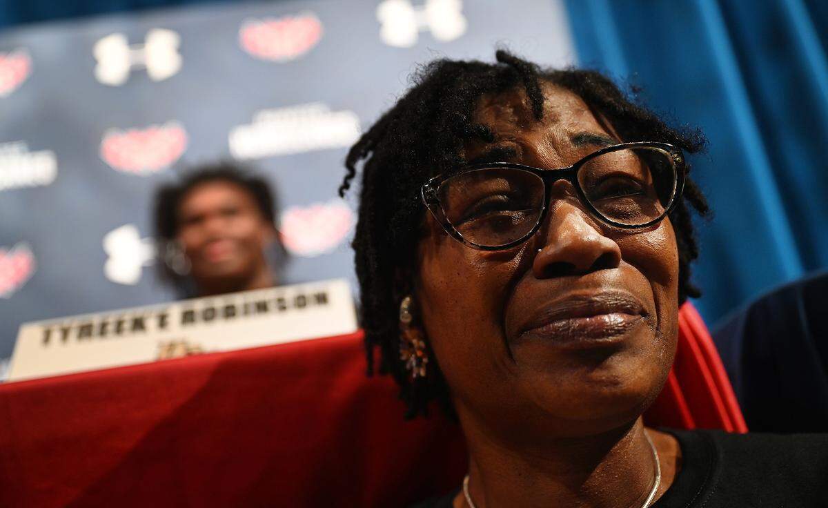 Tyreek’e Robinson’s mother, Tina, cries tears of happiness at signing day at Manatee High on Wednesday, Feb. 7, 2024.