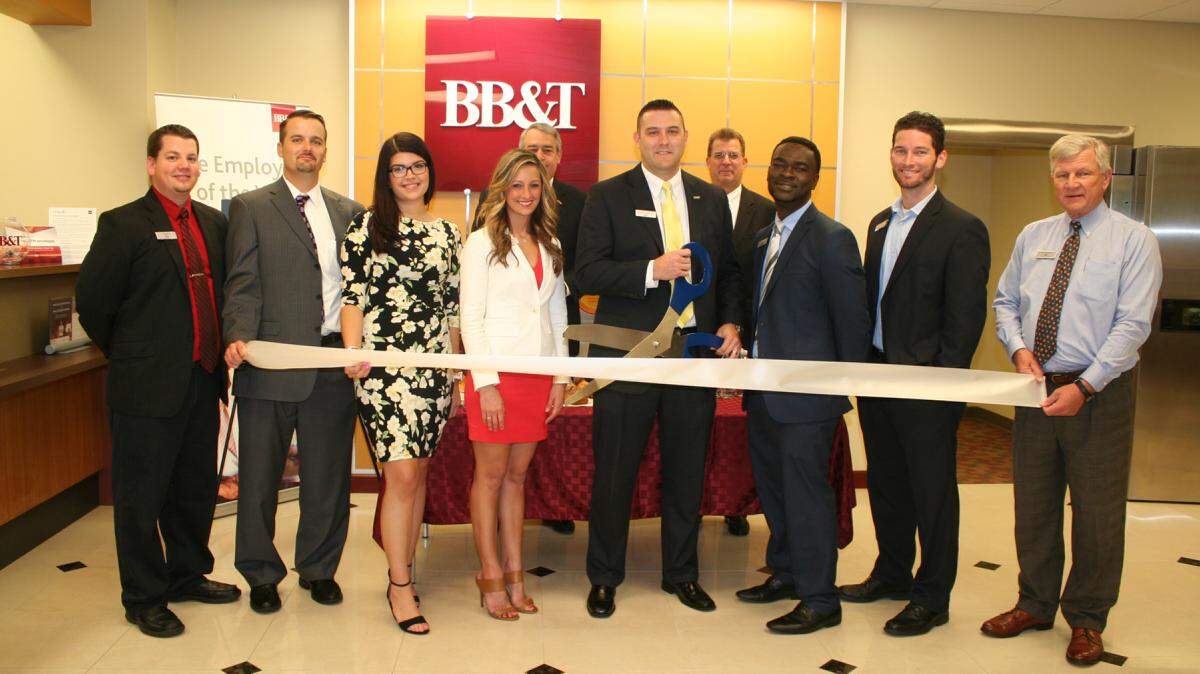 A ribbon cutting was held for BB&T Downtown Bradenton Branch, 921 Manatee Ave. W., Bradenton. The company offers its clients a complete range of financial services including banking, lending, insurance, trust and wealth management solutions. For more information, call 941-745-3445 or bbandt.com. 
 Do you have a ribbon cutting you'd like to submit? Send them to Angie Monroe at amonroe@bradenton.com. 
 Photo courtesy of Manatee Chamber of Commerce.
