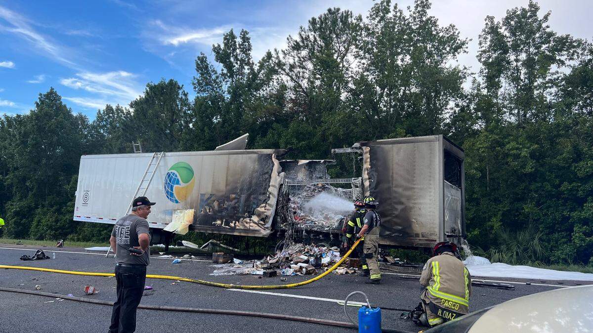 Fire and rescue crews extinguished a tractor-trailer that crashed on Interstate 75.
