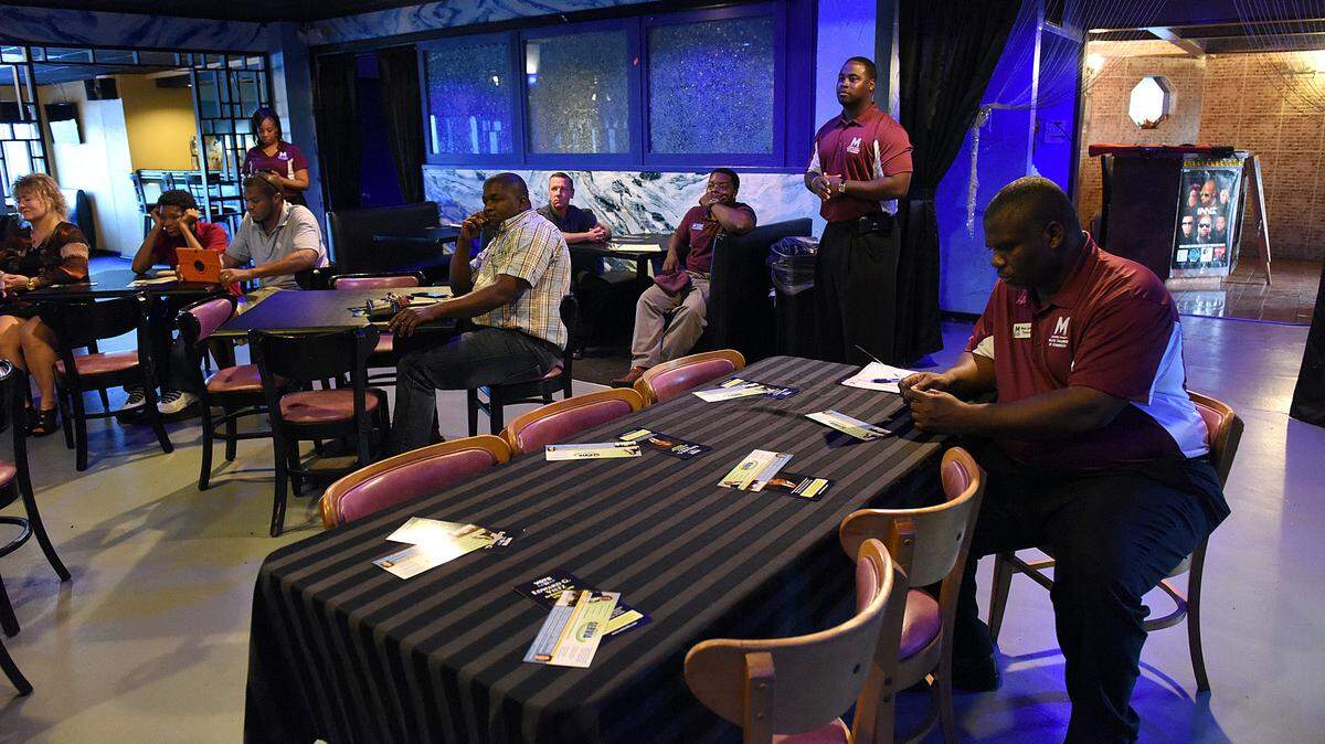 Folks attend a Manatee County School Board forum Thursday by the Manatee Black Chamber of Commerce for school board candidates at the Touch of Class in Bradenton. 
 TIFFANY TOMPKINS-CONDIE/Bradenton Herald