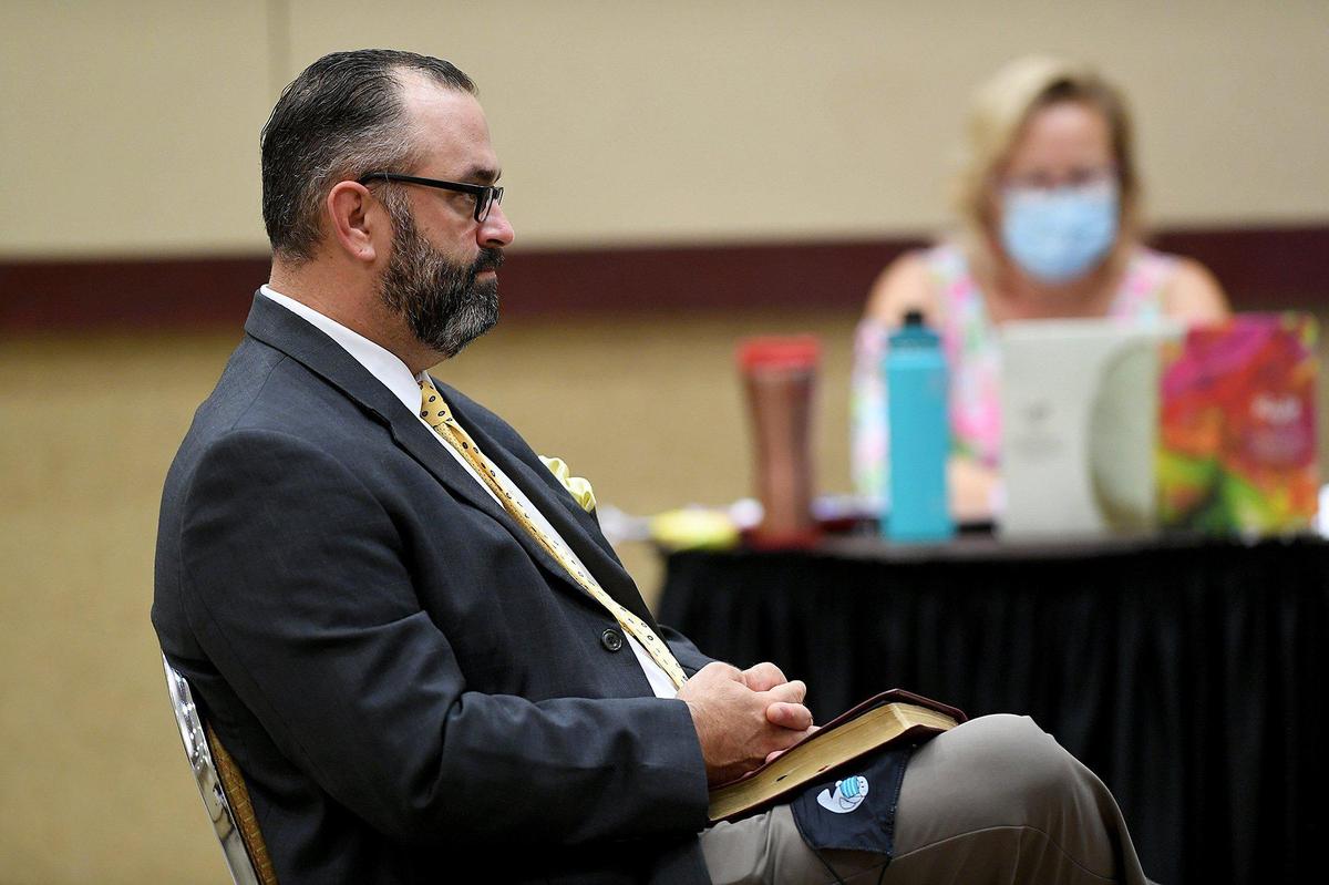 Rev. Joel Tillis waits to speak before Manatee County officials voted 4-3 to end the COVID-19 mask mandate meant to limit the spread of the coronavirus after DeSantis removed all fines and penalties.