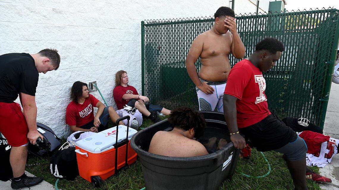 How are high school football teams practicing in Bradenton’s record-setting heat?