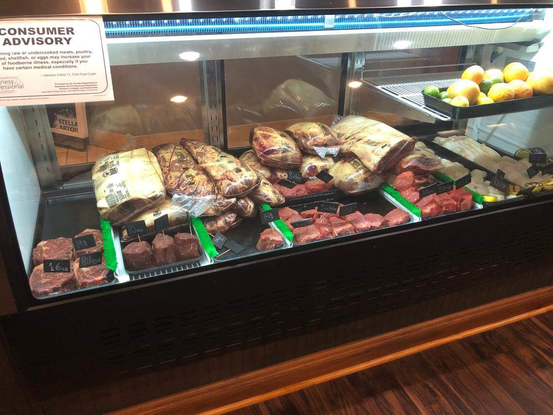 Bourbon & Bones has a market in its front foyer, where customers can buy cuts of meat to cook at home.