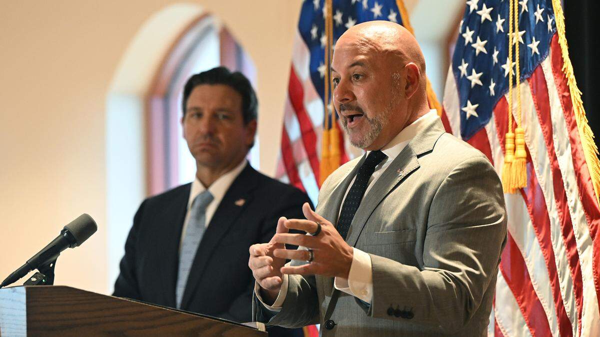 Florida’s new chief financial officer Blaise Inogoglia speaks during a press conference with Governor Ron DeSantis about the state’s plans to bring DOGE to Manatee County. The press conference was held at the Manatee Performing Arts Center in Bradenton on July 24, 2025.
