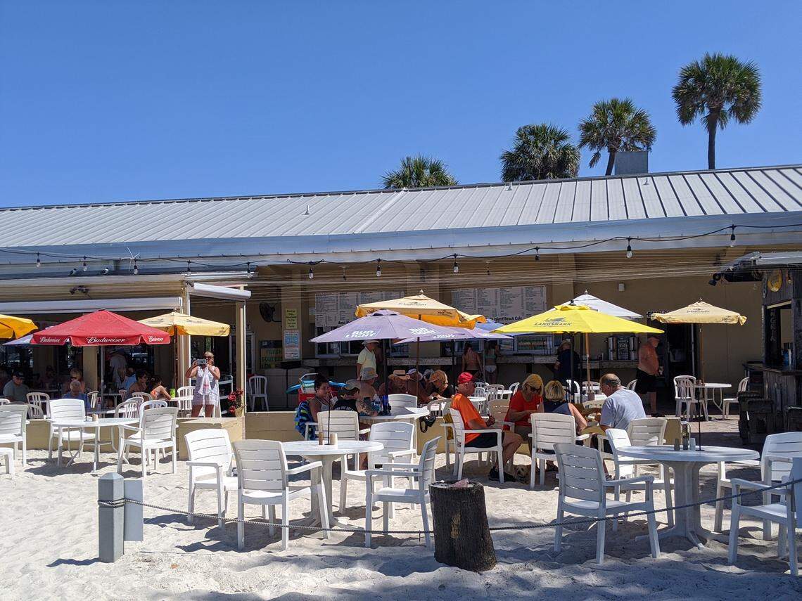 Seating was reduced and spread out at the Anna Maria Island Beach Cafe on Manatee Public Beach Wednesday following the an executive order directing restaurants to reduce capacity to prevent the spread of the coronavirus.