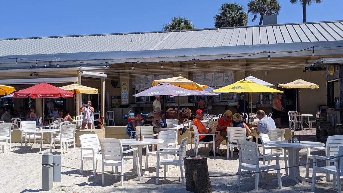 Seating was reduced and spread out at the Anna Maria Island Beach Cafe on Manatee Public Beach Wednesday following an executive order from Governor Ron DeSantis directing restaurants to reduce capacity to prevent the spread of the coronavirus.