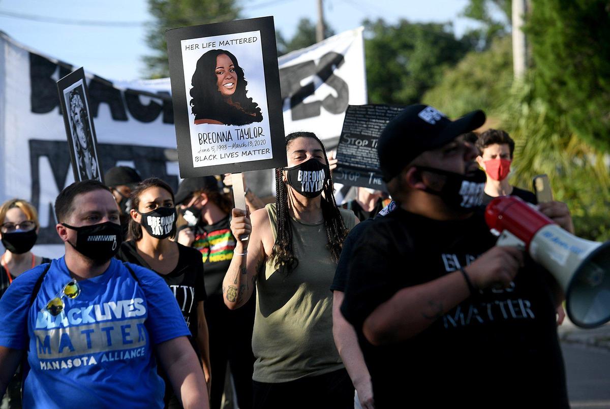 Marchers chant during a Black Lives Matter Sarasota-Manatee Alliance protest march in Bradenton.