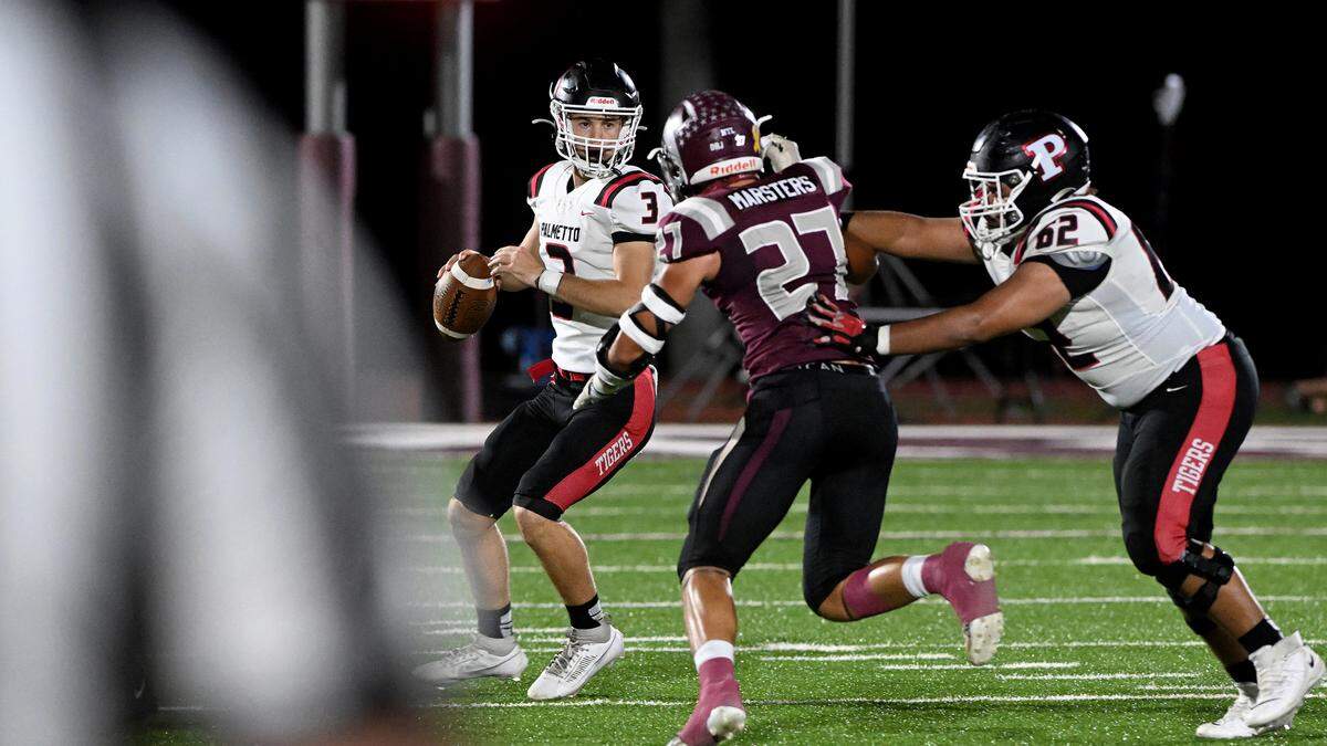 Palmetto’s Clayton Dees pulls back for a pass against Riverview during the FHSAA playoff game in Sarasota Friday, Nov. 10.