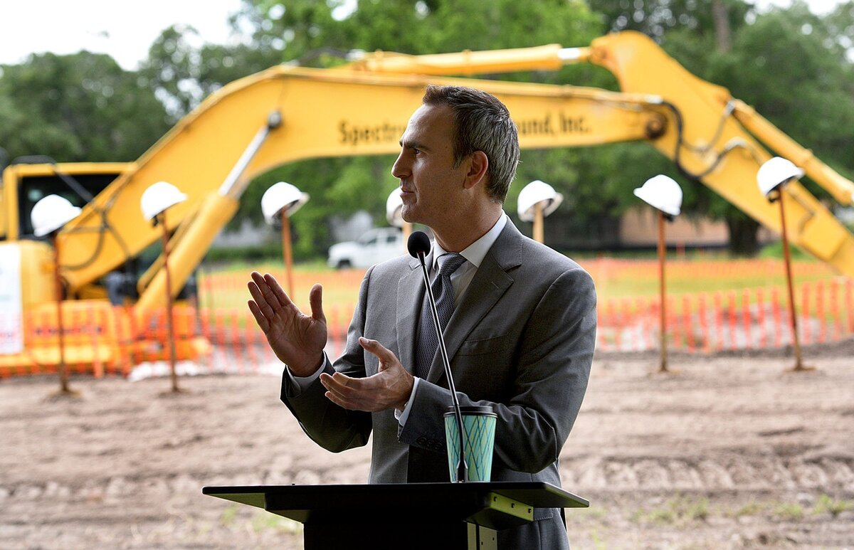 Matthew Rieger, President and CEO of Housing Trust Group addresses a small crowd at the groundbreaking ceremony Monday for The Addison, affordable housing in Bradenton.