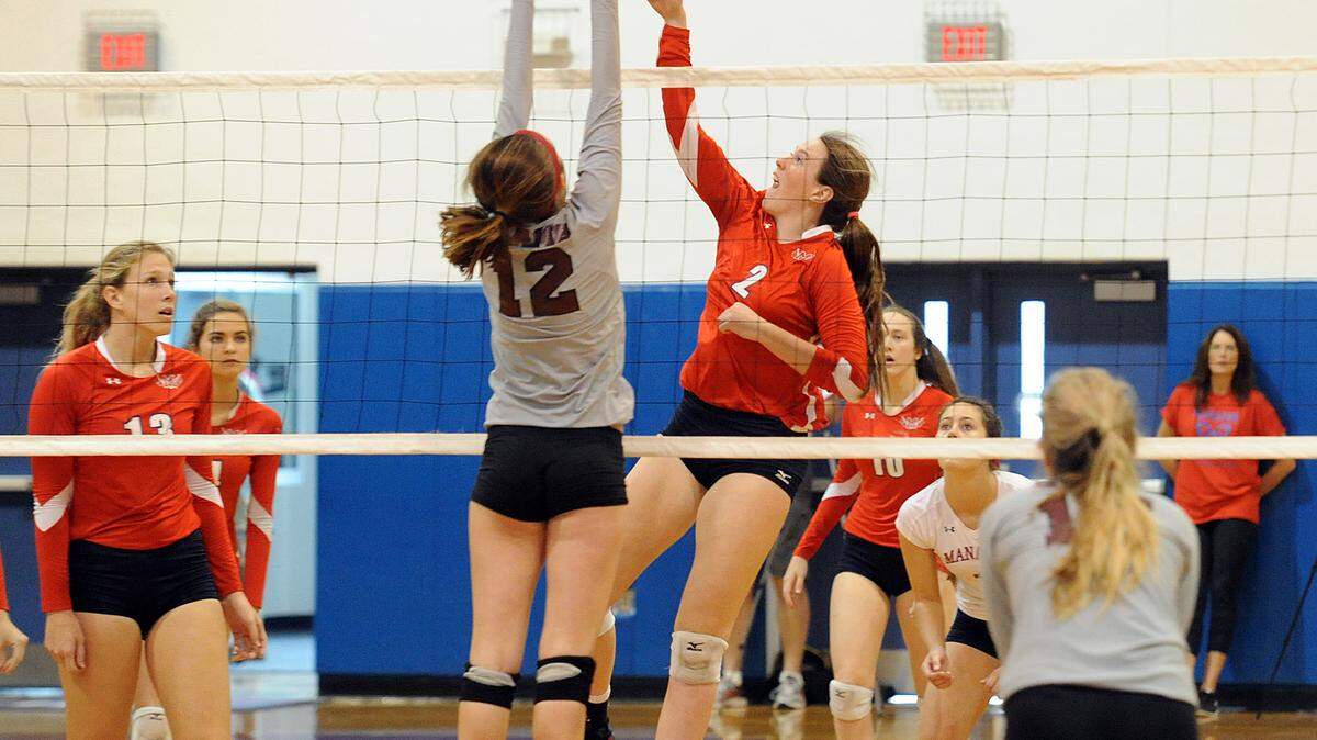 Manatee's Hailey Coulter jumps for the ball in a game against Riverview Saturday in the 2nd round of state playoffs. 
 TIFFANY TOMPKINS-CONDIE/Bradenton Herald