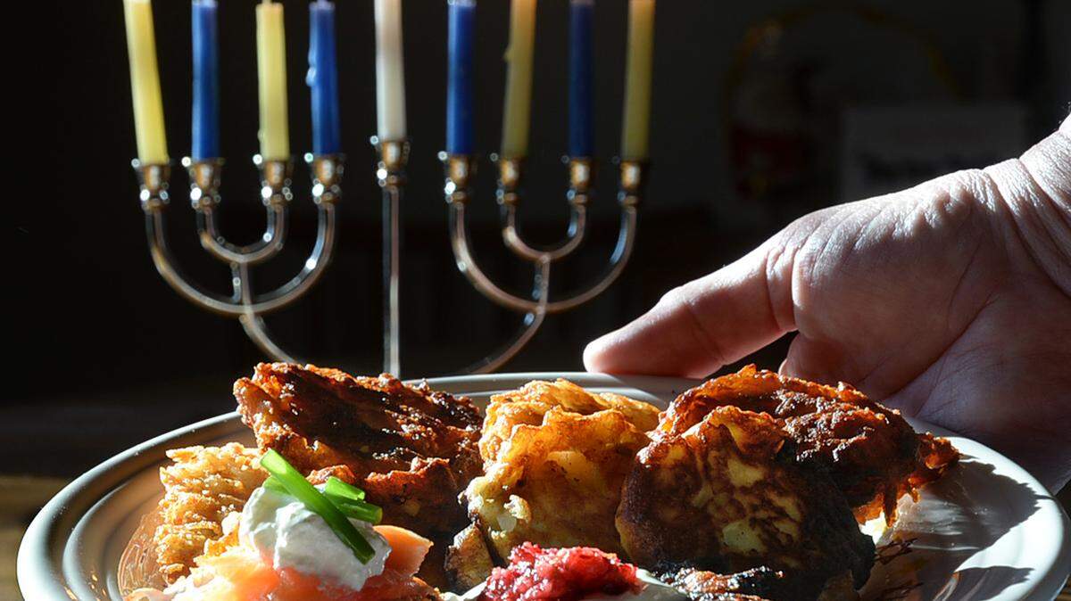 Despite their exotic-sounding name, latkes are just grated potatoes fried and topped with tasty things like sour cream, applesauce, maybe even smoked salmon. What's not to love? TNS
